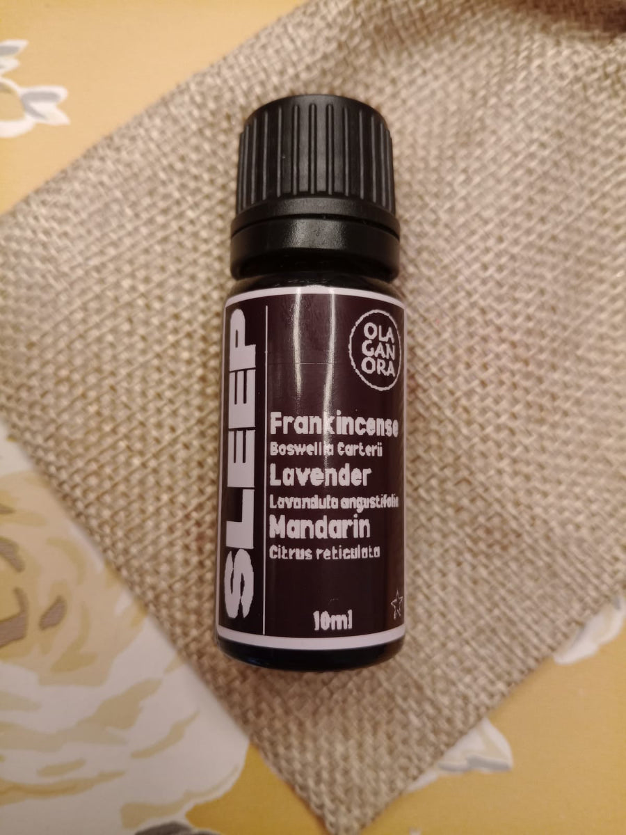 A Bottle of Sleep Diffuser oil. Made with Frankincense, Lavender and Mandarin essential oils.